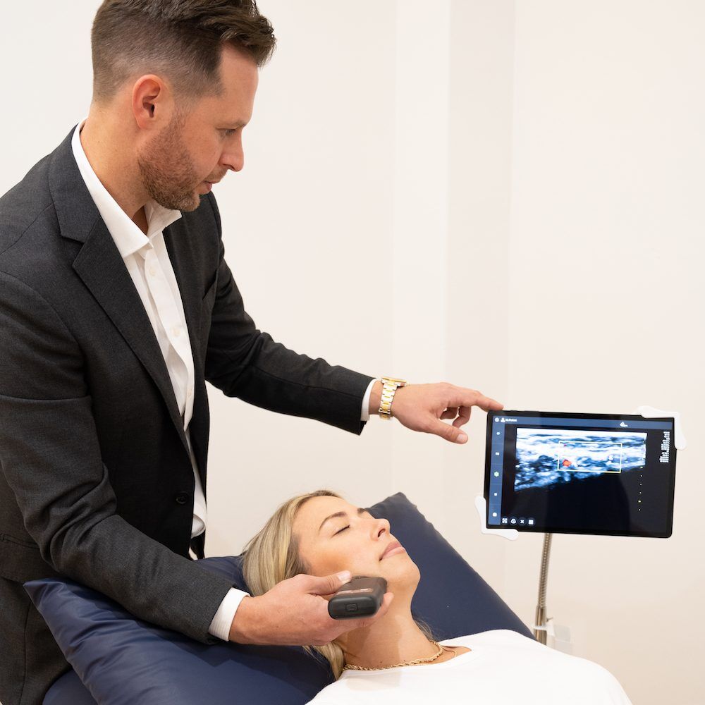 experienced sonographer performing ultrasound scan